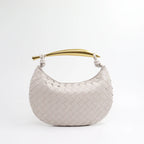 Elyra Woven Curve Handbag